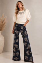Maglia cropped con applicazioni gioiello