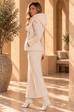 Gilet con cappuccio e paillettes