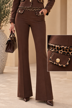 Pantalone bootcut con dettagli animalier