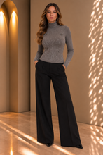 Maglia dolcevita slim con applicazioni luminose
