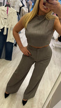 Pantalone palazzo e top