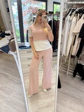 Pantalone palazzo e top