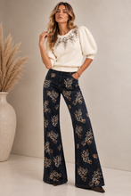 Maglia cropped con applicazioni gioiello