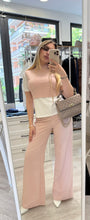 Pantalone palazzo e top