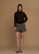 Maglia collo alto con micro paillettes
