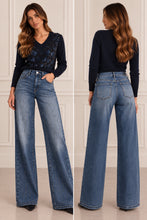 Maglione blu con scollo a V e paillettes - vista fronte e retro