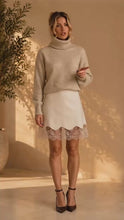 Maglia collo alto con micro paillettes